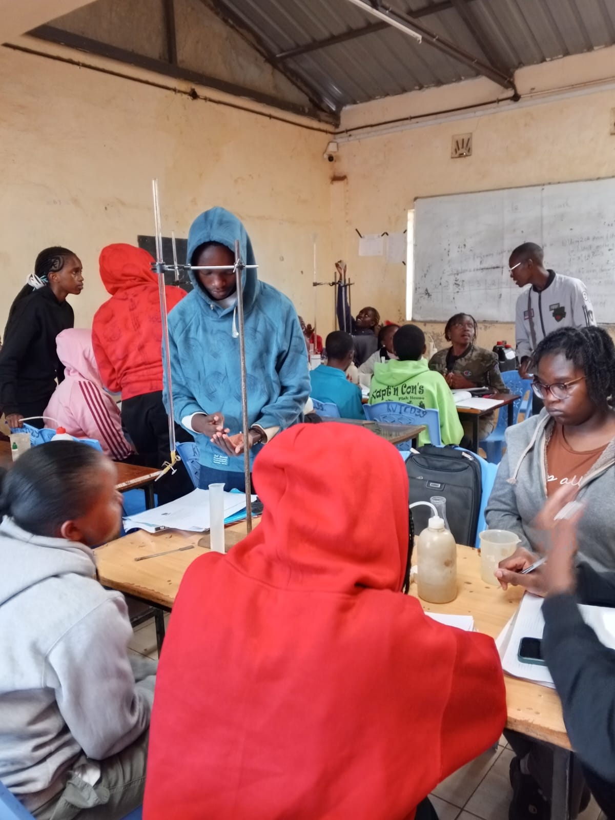Peak Campus students running a chemistry titration practical during holiday tuition in Kinoo, Nairobi